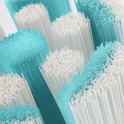 Oral-B opzetborstel, close-up van de borstelharen in blauw en wit.