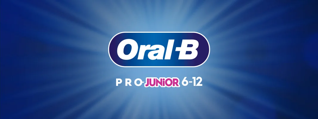 Image 1 - Image features a blue background with radial rays, prominently displaying the logo Oral-B in white and the text PRO-KIDS 0-6 in colorful letters below it.